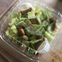 Caesar Salad · Romaine lettuce, croutons,Parmigiana cheese and Caesar dressing.