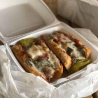Italian Sausage Sandwich · Italian sausage topped with bell peppers, onions, marinara sauce and provolone cheese.