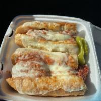 Hot Meatball Sandwich · Homemade meatballs topped with marinara sauce and melted mozzarella cheese.