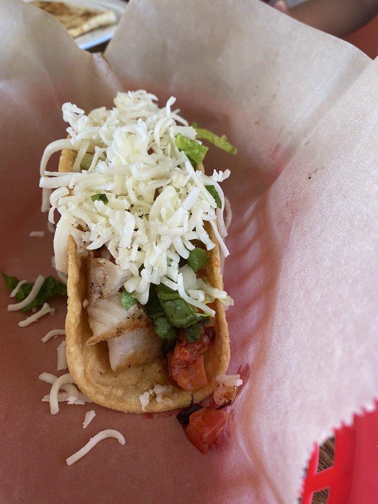 Fish Tacos · Sauteed tilapia, cabbage, tomato, cilantro and onions.