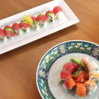 Rainbow Roll · In: crab mix, cucumber and avocado. Out: tuna, salmon, whitefish, shrimp, and ponzu sauce. R...