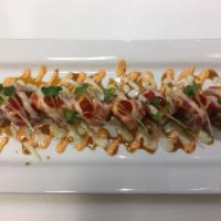 Greenville Roll · In: spicy tuna and cucumber. Out: tuna, salmon, eel sauce, spicy mayo, wasabi sauce, Srirach...