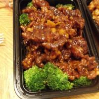 Crispy Beef · Crispy outside and tender inside, chunks of beef with hot and spicy sauce. Served with steam...