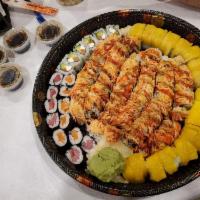 Yummy Yummy Roll · Shrimp tempura, avocado topped with spicy kani special sauce.