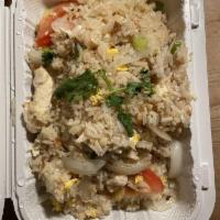 Thai Fried Rice · Served with eggs, tomatoes, onions and green onions.