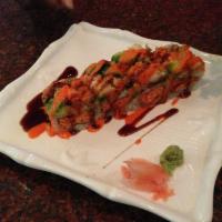 Western Roll · 8 pieces spicy crab with crunch inside and avocado shrimp tempura outside with mayonnaise an...