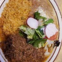Barbacoa · Beef. Served with rice, beans, and tortillas.