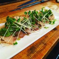 Pepperfin · Albacore, jalapenos, tobiko, green onions, kaiware, and smoked soy sauce.