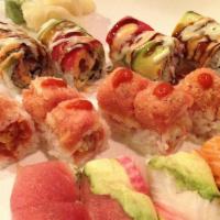 Rainbow Roll · Crab meat, avocado and cucumber top with fresh salmon, tuna, white tuna, avocado.