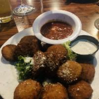 Zucchini Chips · Breaded and deep fried zucchini chips. Served with ranch.