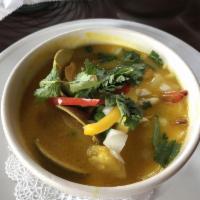 Seafood Soup · A delicious combination of scallops, shrimp and clams in a savory saffron broth. Garnished w...