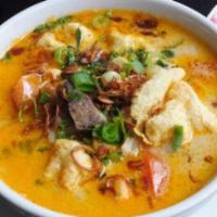 Soto Betawi · Jakarta style of beef soup cooked with coconut milk.