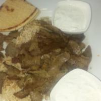 Gyro Bowl · Thinly sliced beef and lamb over rice pilaf served with yogurt sauce.