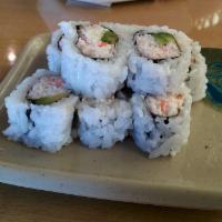 California Roll · 8 pieces. Fluffy sushi rice with roasted seaweed, imitation crab, house mayo mix and avocado.