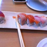 Rainbow Roll · 8 pieces. Assorted fresh fish of the day (Tuna, Yellowtail, Albacore, Shrimp & Salmon), our ...