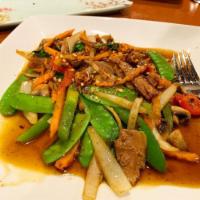 Thai Basil · Bell peppers, carrots, onions, pea pods, mushroom and Thai basil wok tossed in a savory ligh...