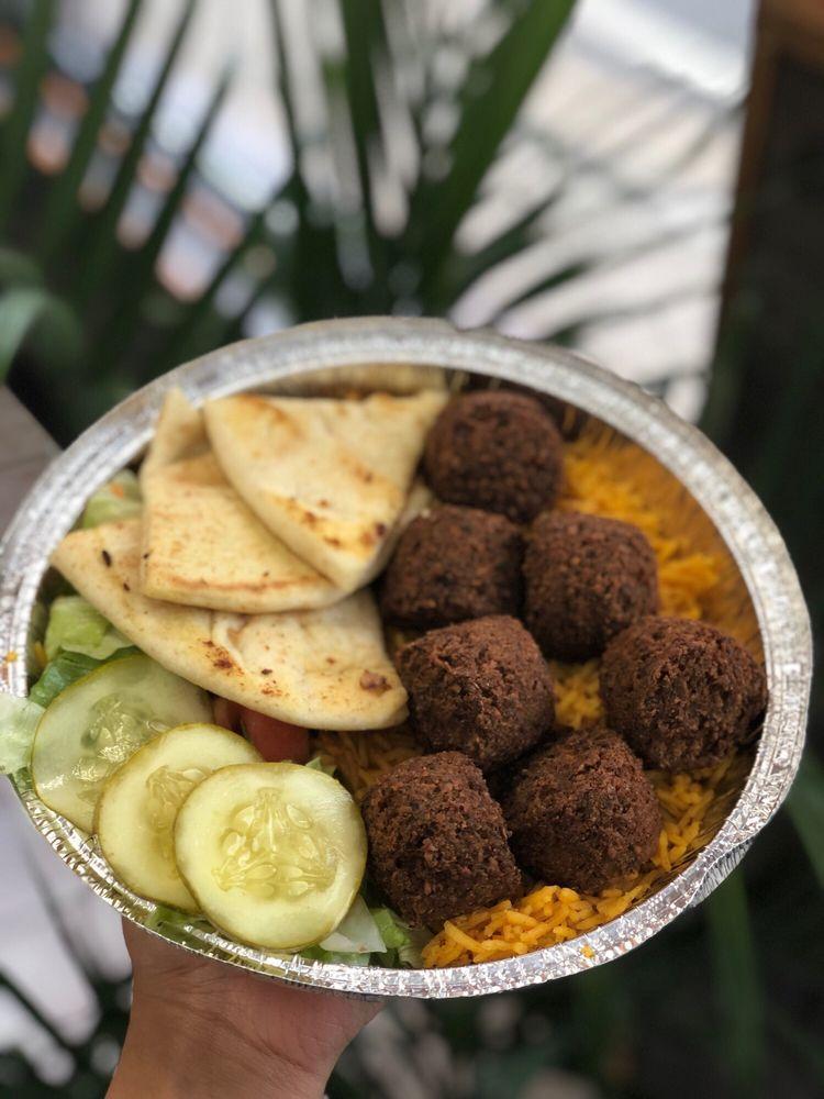 Madina Halal Platter · Pitas · Dessert · Wraps · Halal · Falafel · Salads