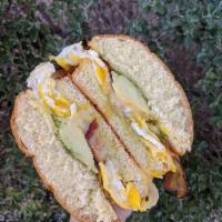 Betty's Bomb Breakfast Sandwich · 2 fried eggs with bacon, avocado, jalapeno jam, Swiss cheese on a toasted brioche bun. Serve...