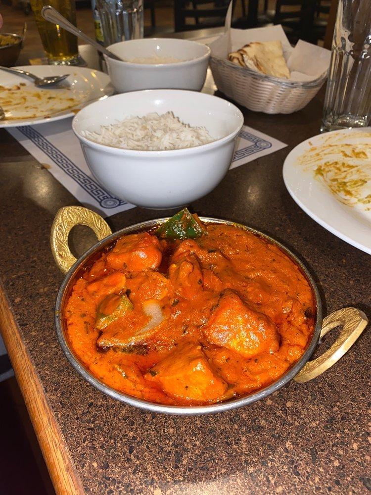 Chicken Tikka Masala · Tender boneless chicken pieces boiled in tandoori and cooked in a mild creamy tomato gravy.