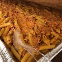 Penne Vodka · Penne with Prosciutto and Onions in a Vodka Pink Sauce