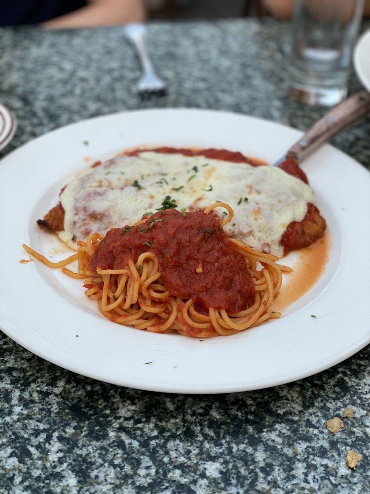 Chicken Parmigiana · Served with homemade spaghetti.