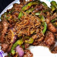 Mongolian Beef · Tender sliced beef with bell pepper, onion and carrots stir fried in a spicy Mongolian sauce...