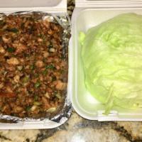 Chicken Lettuce Wrap · Minced chicken with mushroom, water chestnuts and green onions wok stir fried in a house sau...
