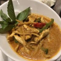 Red Curry · Red curry - red curry in coconut milk, bamboo, bell peppers, and basil with choice of meat o...