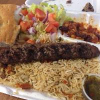 Ground Beef Kabob · Grilled kofta are skewers of ground beef on the top of Afghani rice with fresh cilantro,onio...