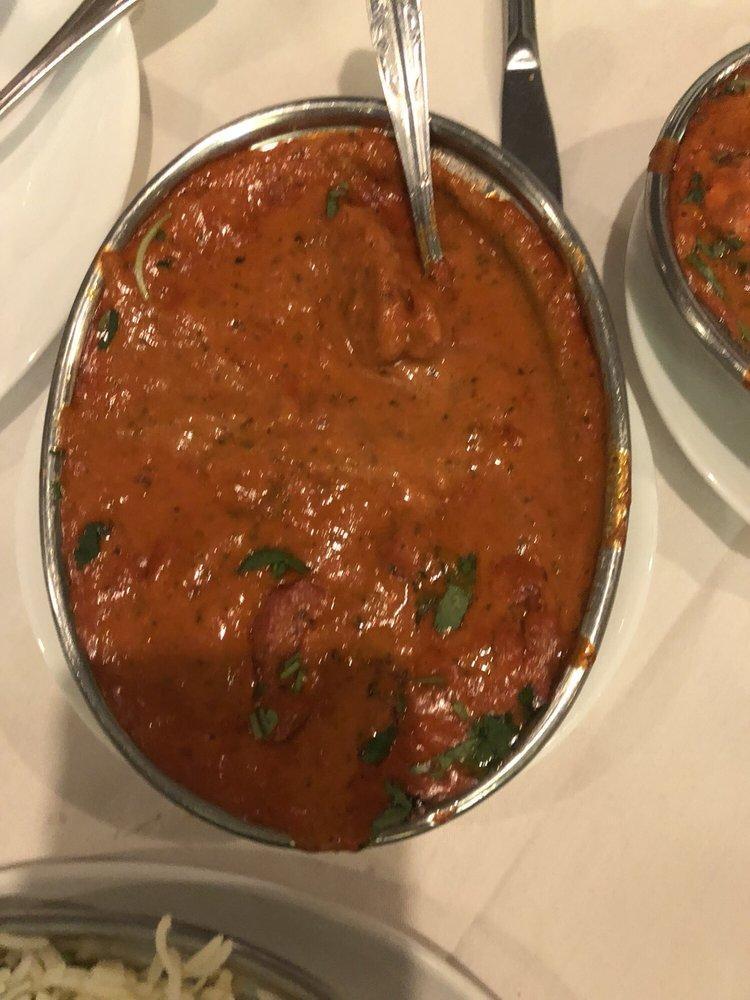 Paneer Tikka Masala · Cubes of homemade paneer cheese, onions, tomatoes and bell pepper put on skewers and cooked in our clay oven and finished with rich creamy sauce.