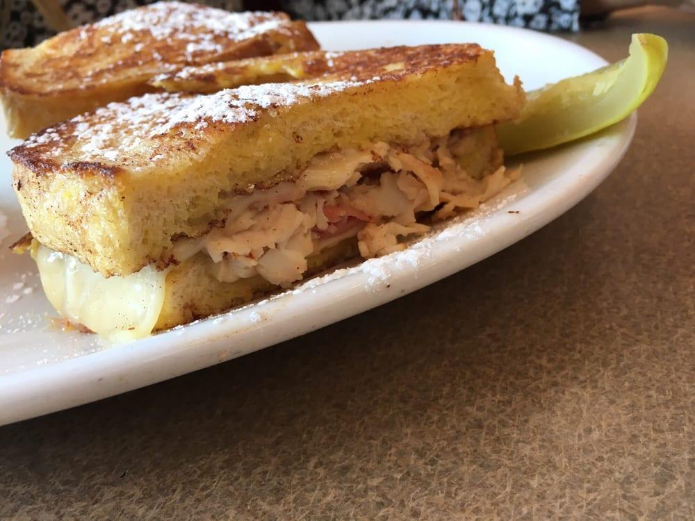 Monte Cristo Sandwich Lunch · Turkey, ham, Swiss, French custard toast, powdered sugar