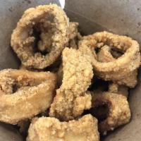 Fried Calamari · Battered and fried rings of squid.