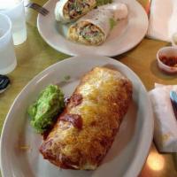Fajita Burrito · With grilled onions, bell peppers, black beans and cheese. Served enchilada style with side ...