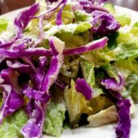 Caesar Salad · Romaine lettuce and pecorino Romano cheese, lightly tossed in Russo’s homemade Caesar anchov...