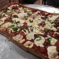 Brooklyn Pizza · Sweet plum tomato sauce, fresh basil, olive oil and fresh mozzarella.