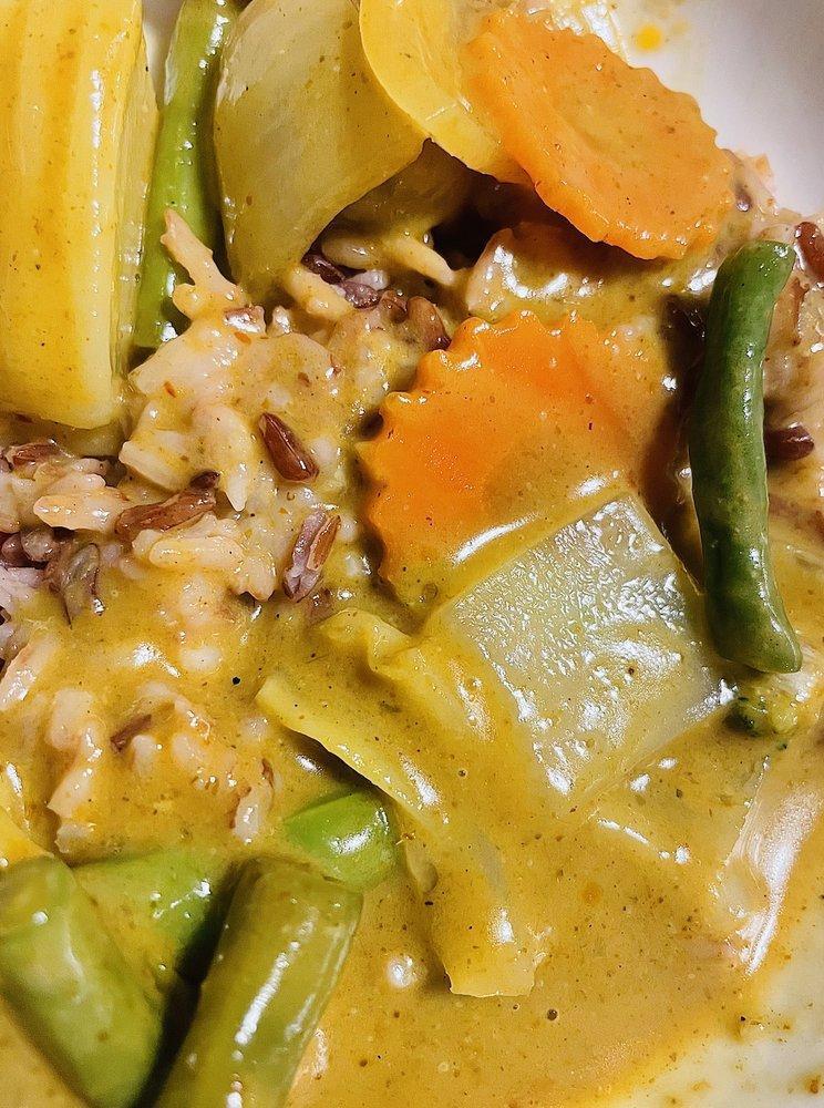 Yellow Curry · Choice of Protein: Vegetable, Tofu, Tofu & Vegetable, Chicken, Mock Duck, Beef, Shrimp, Pork Shank, Seafood, Duck and Salmon Served with mixed wild rice or jasmine rice Yellow curry paste with potato, carrot, onion and green onion in coconut milk