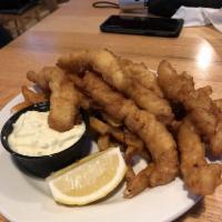 Fish and Chips · House cut and hand-battered cod served with seasoned fries, tartar sauce, and lemon.
