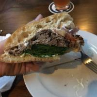 Rosemary Roast Beef & Brie Sandwich · Deli-style roast beef, creamy brie cheese, spinach, red onion, tomato, and our horseradish s...