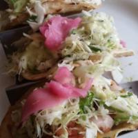 Shredded Chicken Tacos · Cheese, salsa, red chile sauce, cabbage & pickled red onion