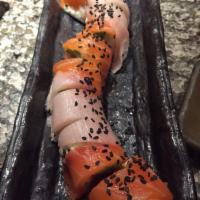 Protein Roll · Spicy tuna, krab, avocado rolled in soy paper, layered with yellowtail and salmon. No rice. 