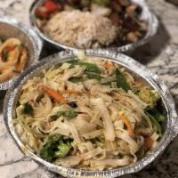 Curry Noodles · Egg noodles or rice noodles wok tossed with snow peas, red bell peppers, and onions in our y...