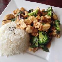 Ginger Basil Chicken · This classic dish is tossed with basil, whole garlic cloves, thin sliced ginger and michu co...