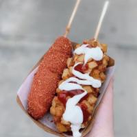 Cheetos · A Korean corndog made with an American all beef frank covered in Flaming Hot Cheetos and fri...
