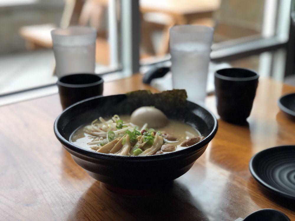 Garlic Tonkotsu Shoyu Ramen · Limited quantity everyday. Specialty extra-rich shoyu-flavored pork broth with lots of garlic. It comes paired with wavy noodles. Included toppings: Seasoned half-boiled egg, pork chashu, seasoned bamboo shoot and beansprouts.
