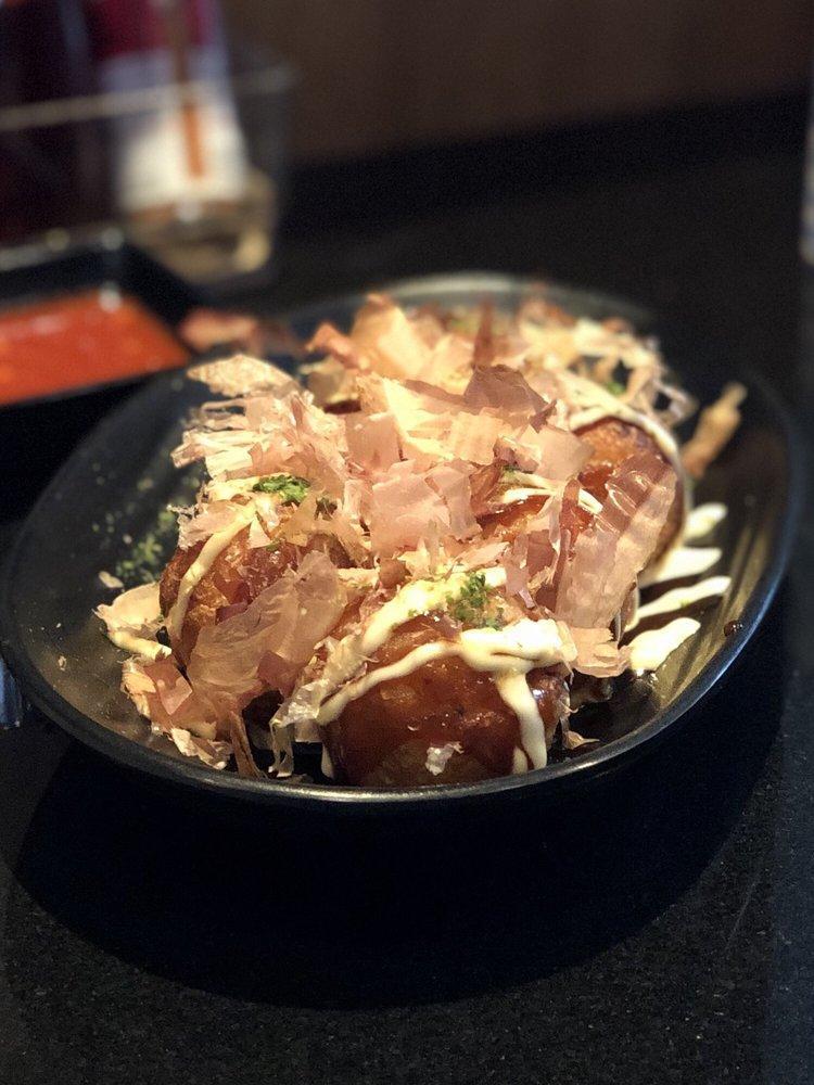 Takoyaki Octopus Dumplings · Octopus dumplings with aonori, okonomi sauce, mayo and bonito flakes.