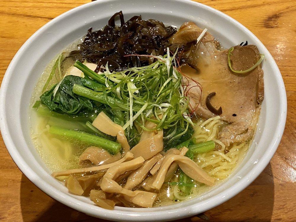 Shio Ramen · French sea salt, kelp, bonito, pork and chicken base. It comes paired with thin noodles. Included toppings: Pork chashu, greens, seasoned bamboo shoot.