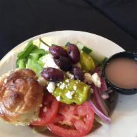 Greek Salad · Tomatoes, Kalamata olives, feta cheese, pepperoncini, red onions, green bell peppers, cucumb...