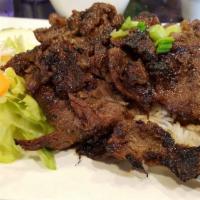 Grilled Beef Over Rice · 