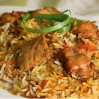 Chicken Biryani · Chicken cooked with homemade blend of spice with basmati rice.