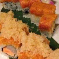 Andover Maki · Broiled salmon and scallops inside, topped with crabmeat and tempura crumbs and spicy mayo.